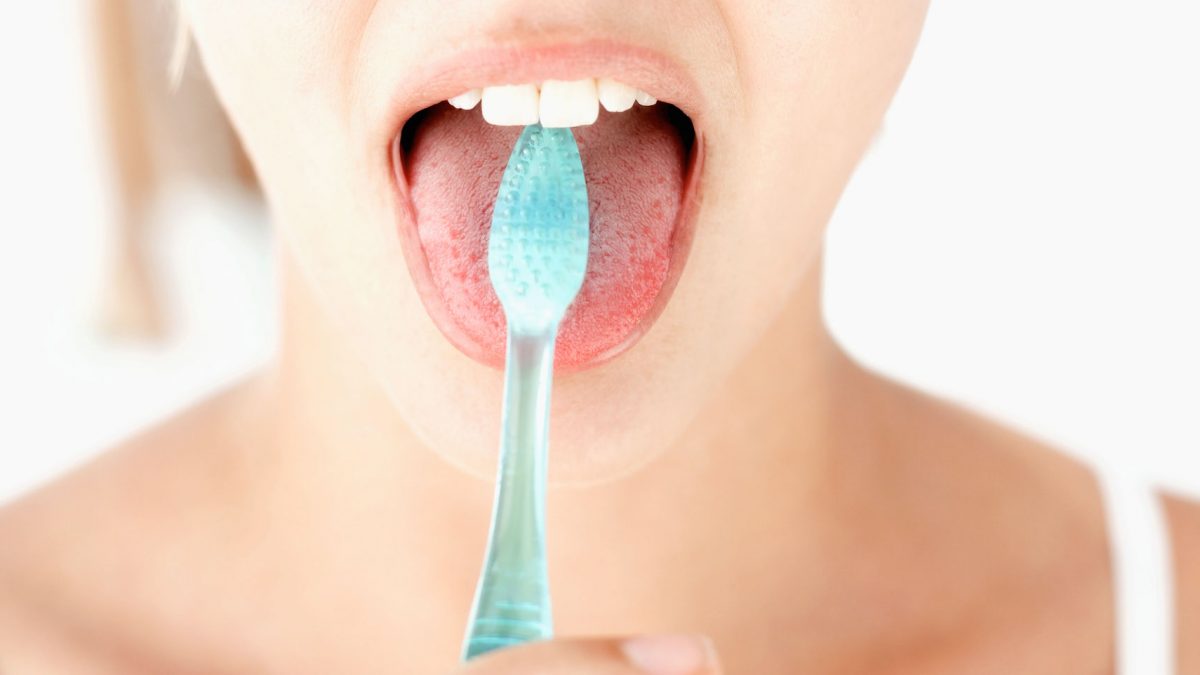 escovar a lingua higiene bucal