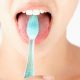 escovar a lingua higiene bucal